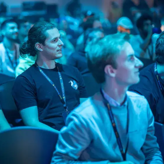 Attendees enjoying a talk at React Brussels